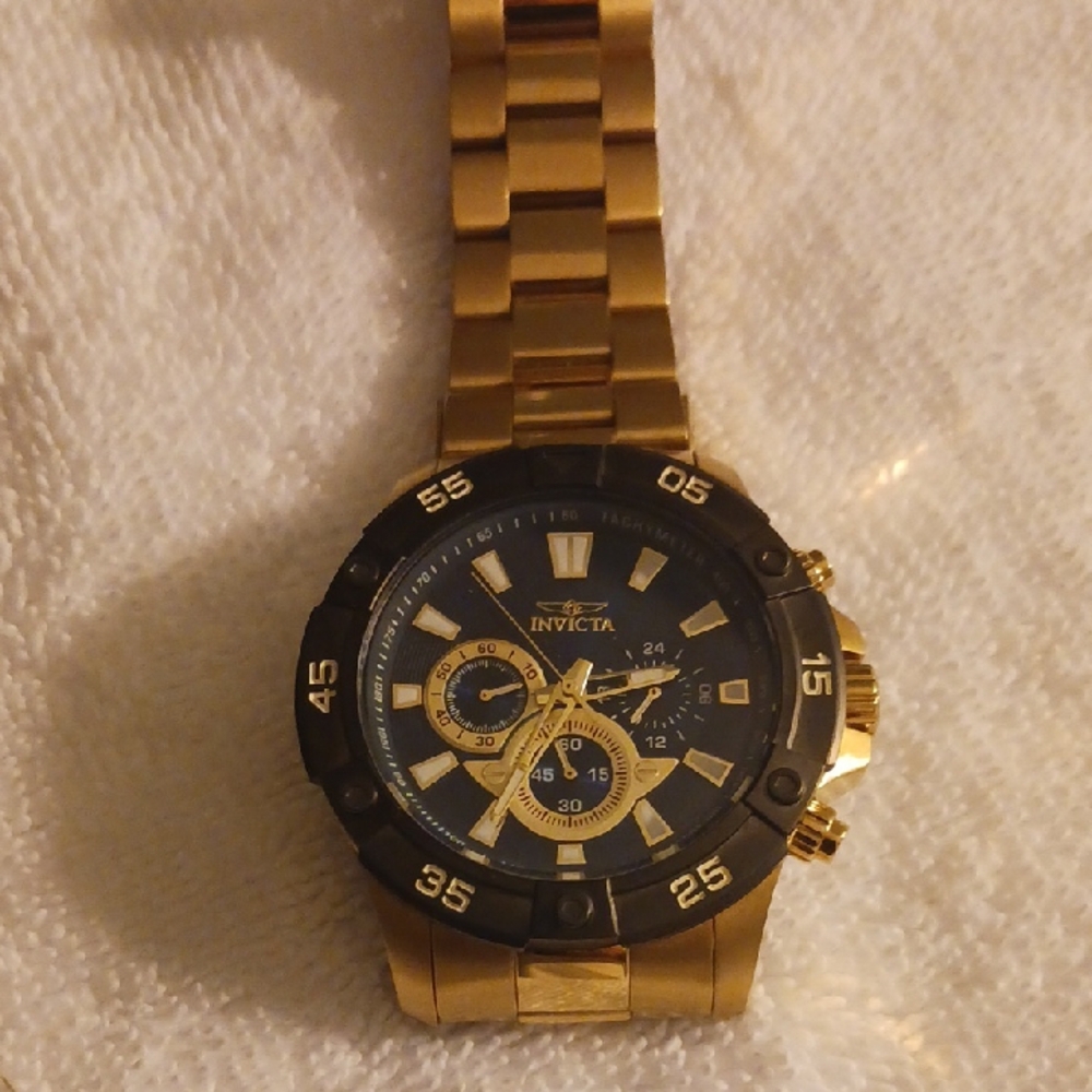 Invicta Gold and Black Chronograph Watch